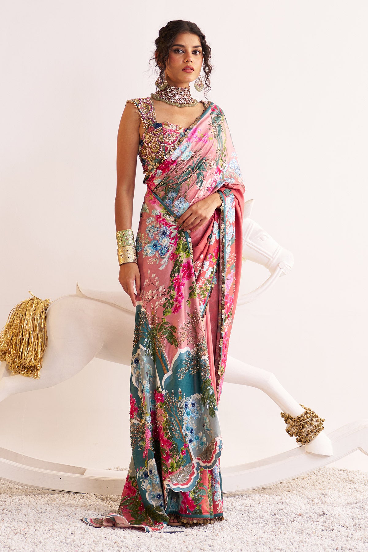 Rust and teal scenery saree