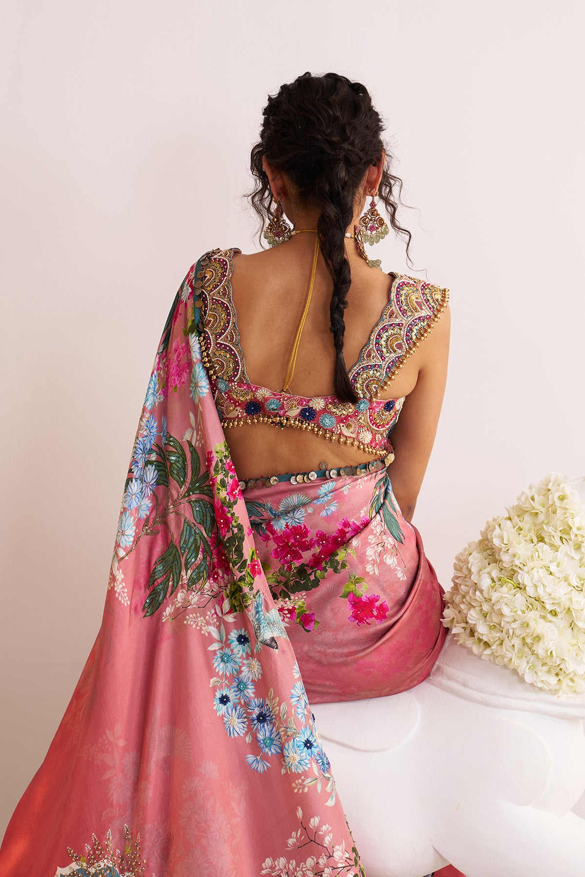 Rust and teal scenery saree